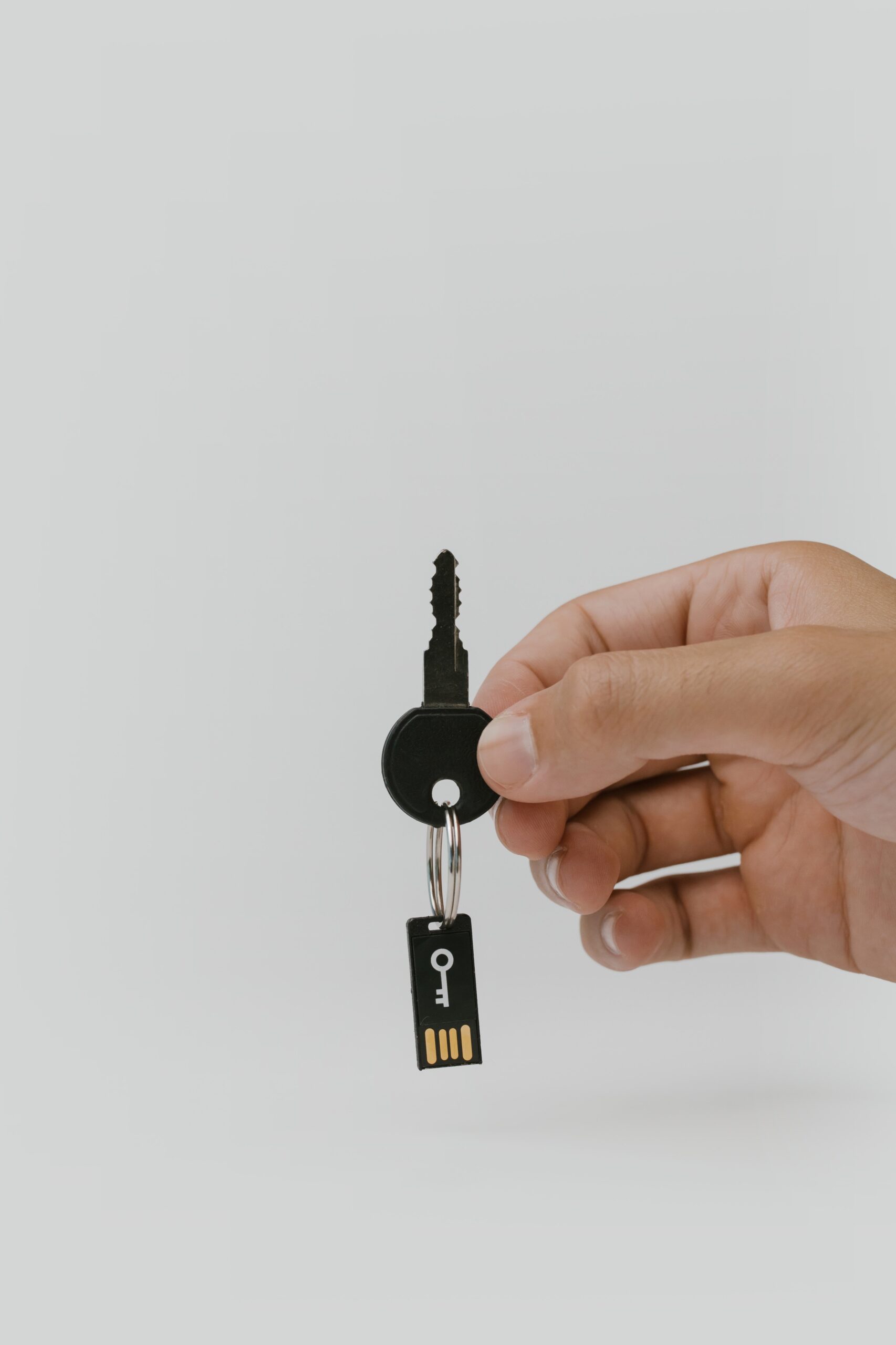 A keychain with a security key attached.